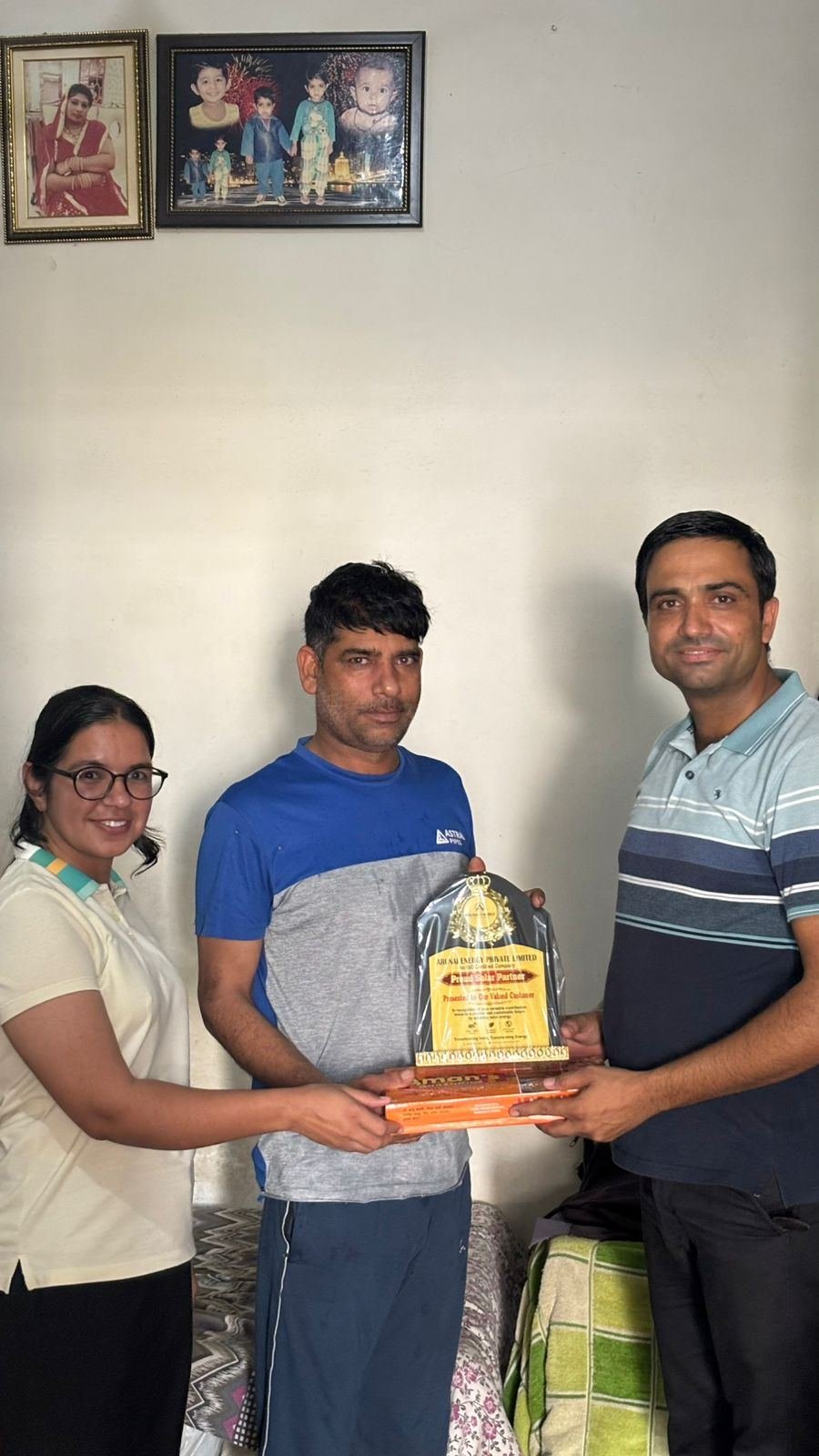 Customer receiving award at home
